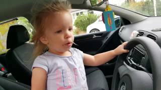 Baby singing and dancing in car to hey mama