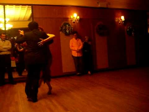  Jennifer Bratt  and  Ney Melo  are  dancing  to  a  tango