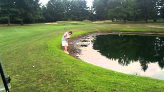 preview picture of video 'Mike hitting a golf ball out of the water'