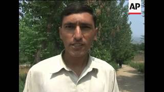 Residents return to village to find scenes of destruction