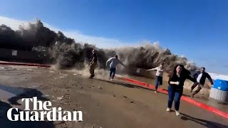 Unusually large waves hit the coast of California amid powerful storms