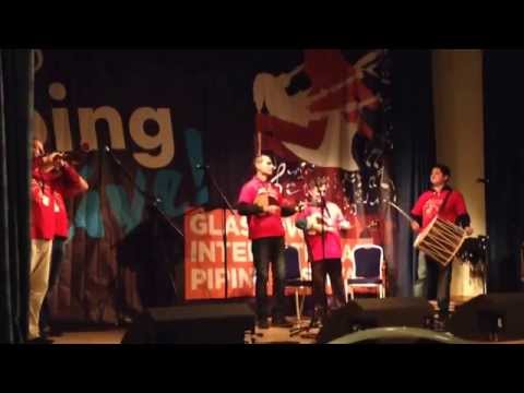 Stefce Stojkovski band performing at the piping center in Glasgow