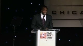 Pastor Charles E. Dates delivers the invocation