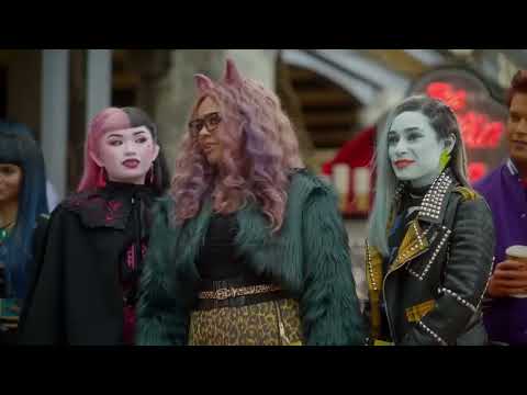 End-card trailer frame with purple neon logo, echoing the album’s glossy pop finish