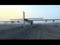 Pilots begin five month round the world solar flight.