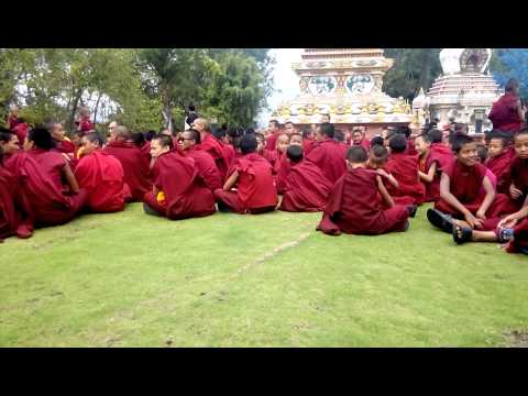 monks gathered in the open after the first earthquake