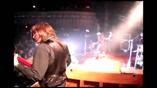 A fan jumps on stage during Build God, Then We&#39;ll Talk