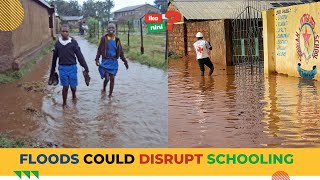 SCHOOLS SET TO OPEN DESPITE FLOOD FEARS