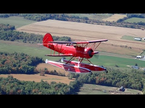Airborne 10.17.17: Waco YMF-5F Flies!, SpaceX Streak, BBJs Rule