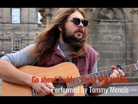 Go Ahead Buddy, performed by Tommy Mencis