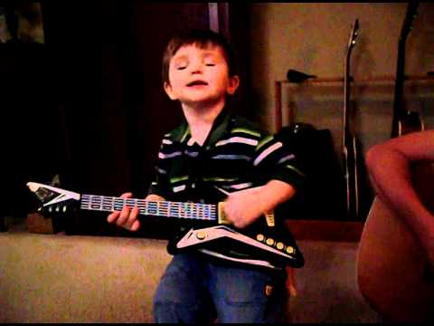 daddy & 2-yr-old son guitar duet