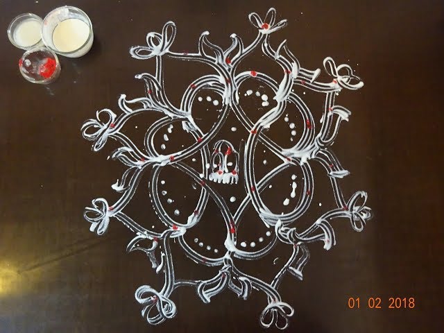 Aripan rangoli design beautiful flowers by maithili