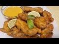 Deep Fried Nile Perch in batter served with lemon and tartar sauce (Mpuuta  fingers)