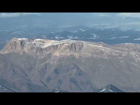 Azerbaijan Airlines. Huge Caucasus Mountain Chain.