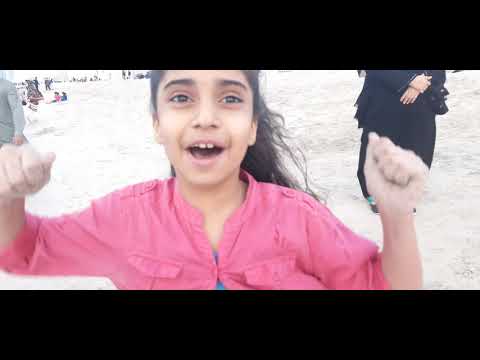 Sharjah beach near Martian sports club-playing with my family and friends.