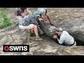 Heroic Moment Group Of Men Team Up To Rescue Baby Elephant Got Stuck In A Hole SWNS