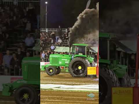 Farm-Stock John Deere 4630 struggles with the brake wagon at the tractor pull in Ysselsteyn