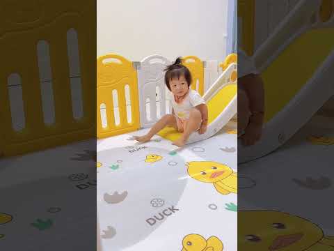 Safe and Exciting: Baby Playpen with Swing and Slide Features #parentingessentials #cutebaby