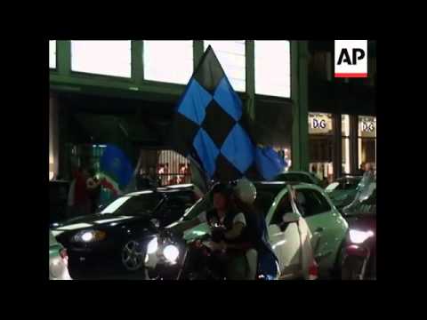 Inter fans cheer Champions League win, NATO troops watching