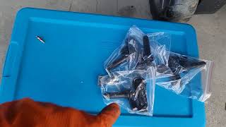 Installing rubber stem TPMS sensors on a 2005 Nissan Armada.