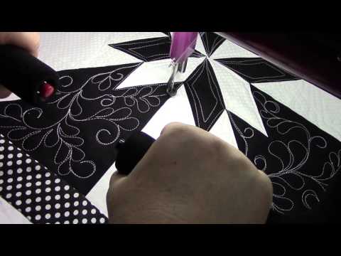 Ann Quilting white thread on black.