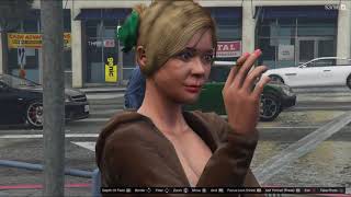 Michael Cought Tracy having a cigarette in the rain by mall