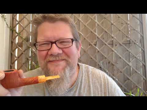 Neue Pfeife (ein)rauchen