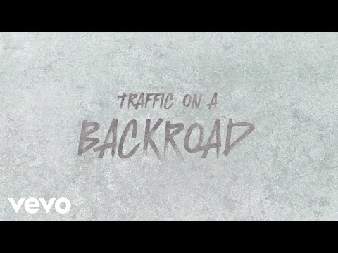Traffic On A Backroad - David J