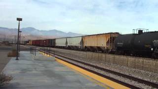 preview picture of video 'Union Pacific 7645 Mixed Freight Train EB through Palm Spring's Amtrak Station'