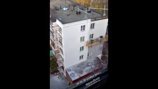 Time-lapse видео: утепление стены панельного дома