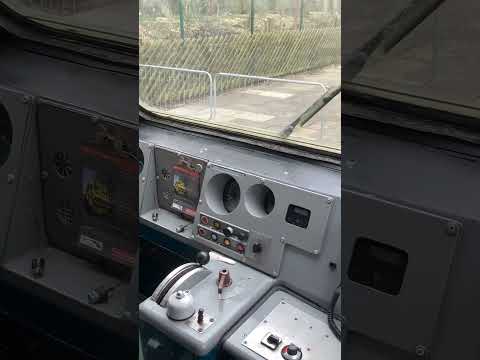 Inside the cab of HST power car 43044 with group member Alan explaining the condition of unit #HST