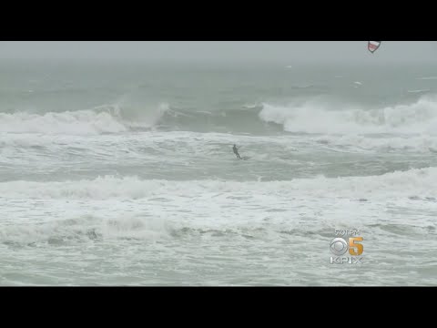 Despite High Surf Warning, Dozens Still Out At Ocean Beach
