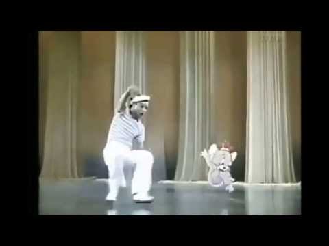 Gene Kelly and Jerry Mouse. It's like that