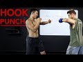 North American Muay Thai Champion Teaches How to Throw a Hook Punch in Boxing