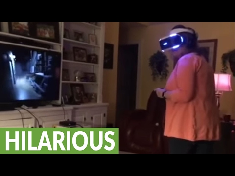 Mom completely freaks out playing VR horror game