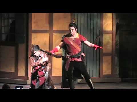 Gaston admires Belle in Broadway scene