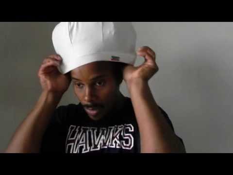 How to put on your Jah Roots Stretch Hat in 30 seconds....