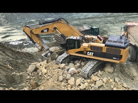 Caterpillar 385C Excavator Loading Trucks And Caterpillar Dumpers - Kivos Ate