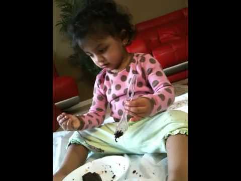 Sreenidhi having choclate cake and describing it..