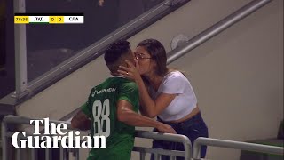 Footballer rushes to kiss wife in celebration … 