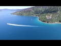 Panning around to see Endeavour Inlet, you can get a great perspective of Camp Bay and Punga Cove. Take a look at this bay and its wharf, store and swimmers in the shallows.