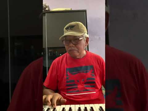 Menanti Di bawah Pohon Kamboja