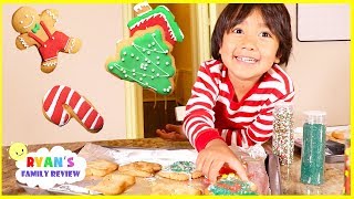 Ryan bakes kids size Christmas Cookies with Daddy and Mommy!