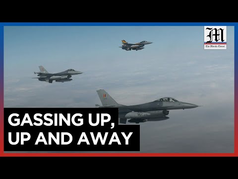 F-16 fighter jets refuel on air in Arctic Challenge exercise