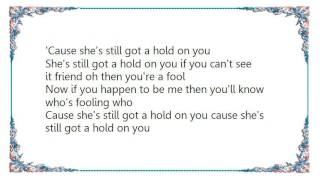 Charley Pride - She's Still Got a Hold on You Lyrics