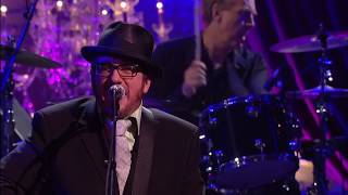 Elvis Costello performs "The Hunter Gets Captured By The Game"