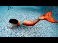 Mermaids Swimming and Playing Underwater