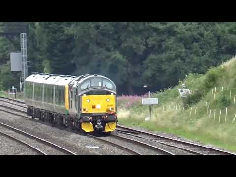 class 37s passing Stoke works jn 37884 37800 37601