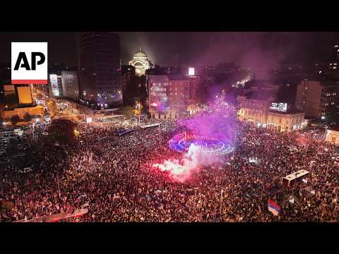 Crowds celebrate in Belgrade after opposition defeats Vucic in Serbia election