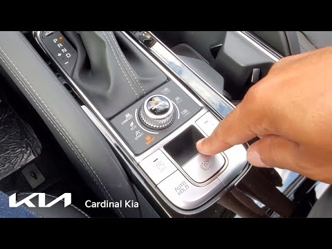 Part of a video titled 2022 Kia Telluride - How To Use Your Electronic Parking Brake with Auto ...